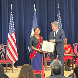 Rani Yan Yan receiving Secretary’s Award for Global Anti-Racism.