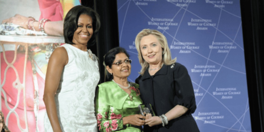 Aneesa Ahmed with Hillary Clinton and Michelle Obama.
