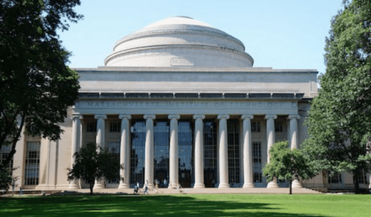 a large building with columns and a dome on top of it.