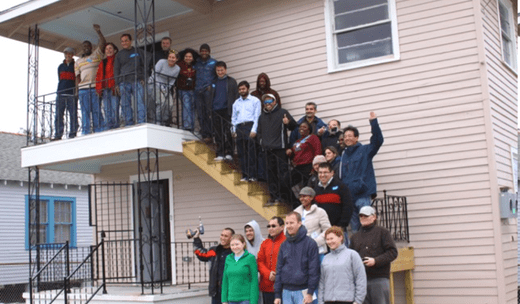 a group of people standing on stairs